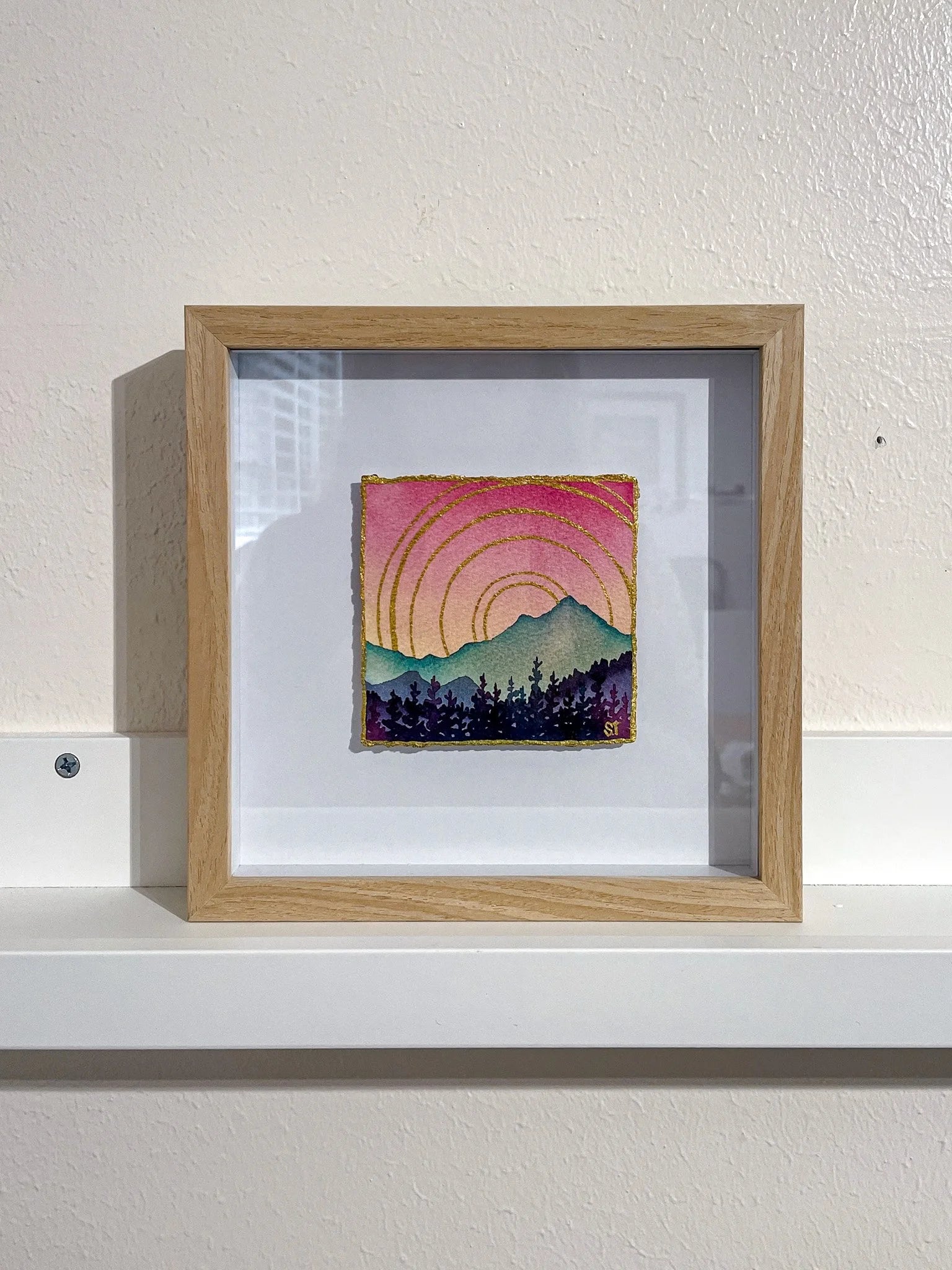 Crowned Colorful  - a framed mountain landscape with gold embellishment