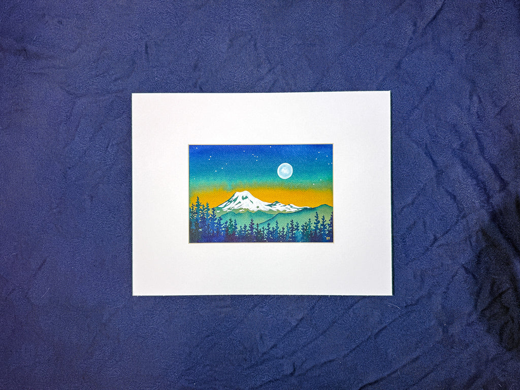 Small painting of a mountain landscape with trees and a moon on a blue textured background